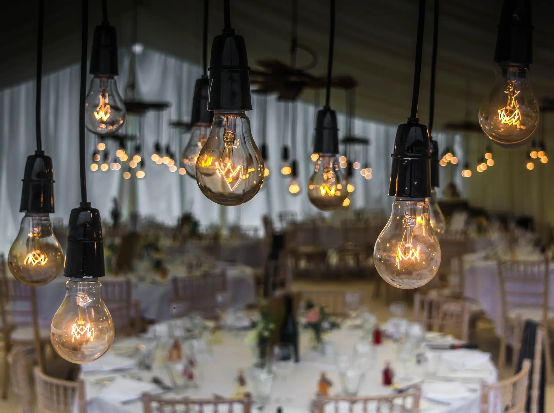 Elegant hanging light bulbs background